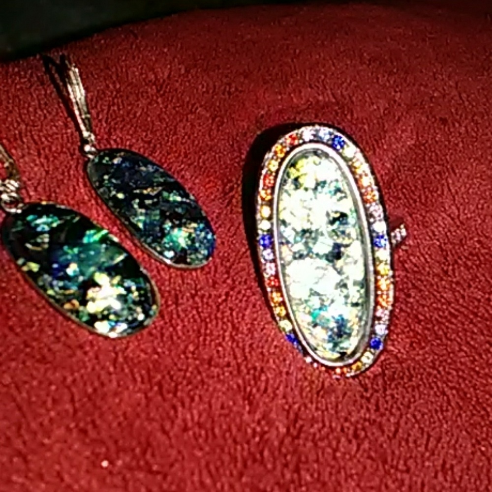 A boulder opal ring and earring set